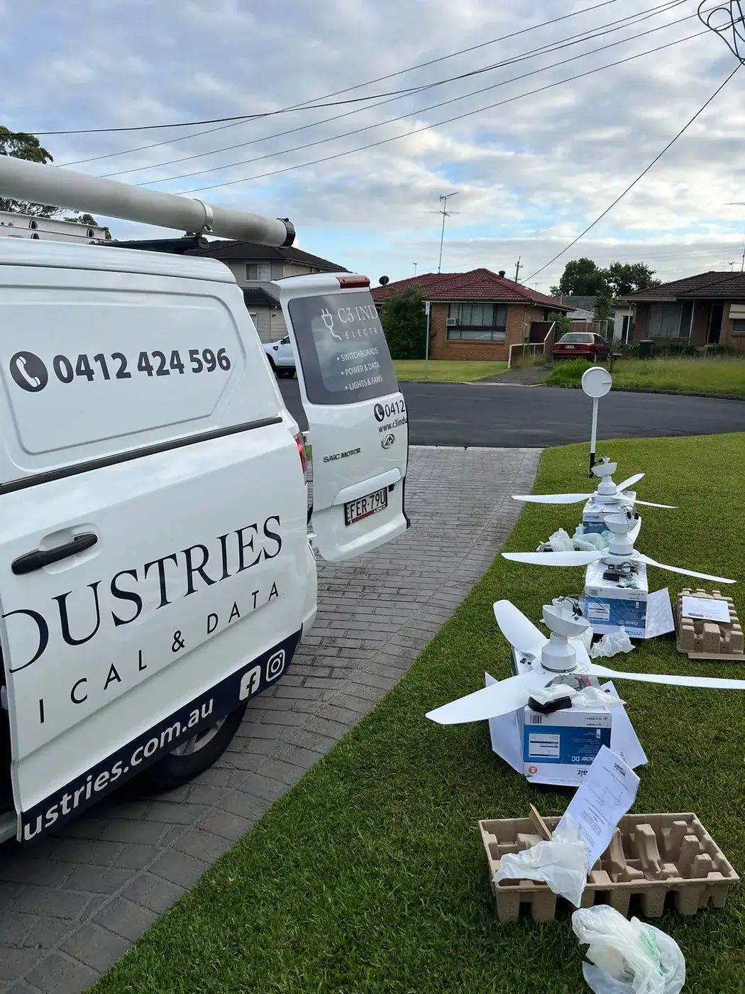 New ceiling fans unloaded from the C3 Industries van ready to install